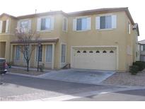 Two story home with a front yard, two car garage and neutral paint at 8003 Retriever Ave, Las Vegas, NV 89147