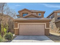 Charming two-story home with a two-car garage and neutral color scheme in a well-maintained neighborhood at 9241 Placer Bullion Ave, Las Vegas, NV 89178