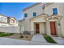 Charming two-story home featuring a welcoming entrance, tasteful landscaping, and a well-maintained facade at 7348 N Decatur Blvd # 5, Las Vegas, NV 89131