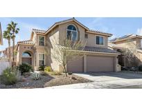 Charming two-story home featuring desert landscaping and a spacious two-car garage at 9417 Grenville Ave, Las Vegas, NV 89134