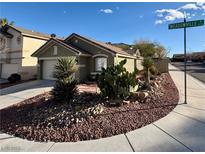 Charming single-story home with a desert-landscaped front yard and inviting curb appeal at 9721 Meadowville Ave, Las Vegas, NV 89129
