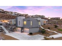 Contemporary home with two-car garage and hillside views at 1455 Macdonald Ranch Dr, Henderson, NV 89012