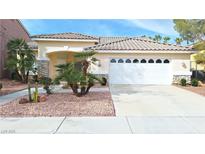 Charming single-story home with a well-maintained front yard and a two-car garage at 3725 Climbing Rose St, Las Vegas, NV 89147