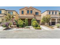 Inviting two-story home with a well-manicured front yard and attached garage at 2819 Canonero St, Las Vegas, NV 89142