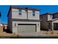 Charming two-story home with a gray exterior, a paved driveway and a two-car garage at 5181 Capucina St # Lot 6, Las Vegas, NV 89122