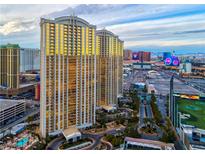 Stunning exterior view of high-rise building, showcasing its architectural design and surrounding city landscape at 145 E Harmon Ave # 2603, Las Vegas, NV 89109