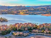 Beautiful aerial view of lakeside community and mountains with terracotta-roofed condos at 20 Via Mantova # 106, Henderson, NV 89011