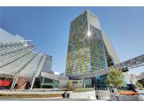 Striking high-rise condo building with modern architectural design and lush landscaping at 3722 Las Vegas Blvd # 1609, Las Vegas, NV 89158