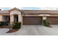 Charming single-story home with a two-car garage and well-maintained landscaping at 9293 Boltonia Ct, Las Vegas, NV 89149