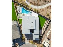 Stunning aerial view of a modern home with a backyard pool and clean, geometric landscaping at 11943 Rockview Point St, Las Vegas, NV 89138