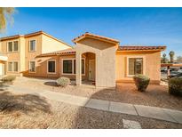 Charming one-story home with terracotta roof and inviting front entrance at 2131 Hussium Hills St # 104, Las Vegas, NV 89108