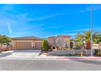 Charming single-story home features a three-car garage and beautiful desert landscaping at 2357 Wisconsin Dells Dr, Henderson, NV 89044