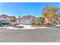 Charming single-story home with a well-maintained front yard, two-car garage, and a tile roof at 2459 Avenida Cataluna, Henderson, NV 89074