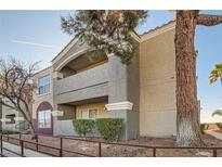 Attractive condo building showcasing an exterior view with balconies and well-maintained landscaping at 5055 W Hacienda Ave # 1116, Las Vegas, NV 89118