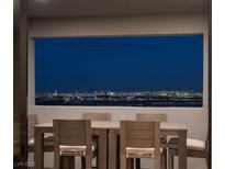 Stylish dining area showcasing spectacular city views at 826 Willits St, Las Vegas, NV 89138