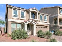 Charming two-story home with a well-manicured lawn and a welcoming entrance at 8573 Silver Coast St, Las Vegas, NV 89139