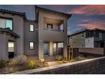 Charming two-story home features a private balcony and manicured front yard at 500 Pear Lake St, Las Vegas, NV 89138