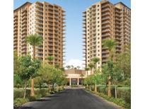 Luxurious high-rise condo with beautifully landscaped entrance and palm tree lined drive at 8255 Las Vegas Blvd # 415, Las Vegas, NV 89123