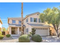Charming two-story home with blue shutters and a well-manicured lawn at 11004 Dornoch Castle St, Las Vegas, NV 89141