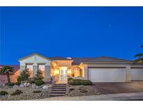 Charming single-story home featuring a well-manicured yard and inviting entryway at 1964 Oliver Springs St, Henderson, NV 89052