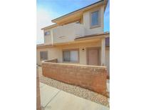 Inviting home featuring a private front patio and neutral-toned stucco exterior at 2050 N Los Feliz St # 176, Las Vegas, NV 89156