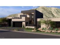 Modern two-story home featuring a clean, geometric design with dark accents and desert landscaping against a mountain backdrop at 4337 Cameron Brook Ct, Las Vegas, NV 89129