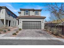 Charming two-story home with a spacious driveway, tile roof, and neutral paint scheme at 9330 Brookmont Ave, Las Vegas, NV 89149