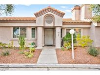 Charming home featuring desert landscaping and a covered front entry at 1451 Di Blasi Dr # 102, Las Vegas, NV 89119