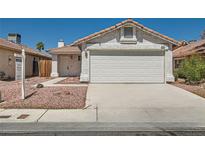 Charming single-story home with a two-car garage, stucco siding, and a well-maintained yard at 6412 Yarmouth Dr, Las Vegas, NV 89108