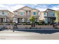 Charming two-story home boasts a well-maintained front yard and inviting curb appeal at , Henderson, NV 89015