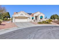 Charming single-story home featuring desert landscaping, a two car garage and solar panels at 3109 Bangor Ct, Las Vegas, NV 89134