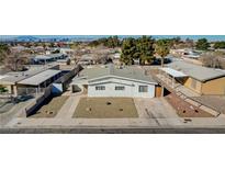 Modest single-story home with desert landscaping and a concrete driveway at 173 Betty Ln, Las Vegas, NV 89110