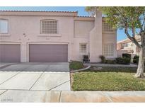 Charming two-story home with a well-maintained lawn and a two-car garage, perfect for suburban living at 513 Rafkin Pl, Henderson, NV 89052