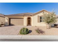 Charming single-story home with a well-manicured front yard, covered entryway, and two car garage at 6156 Ava Ridge Ave, Las Vegas, NV 89141