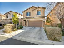 Charming two-story home with a well-manicured lawn, a spacious driveway, and a two-car garage at 854 Earth Luster Rd, Las Vegas, NV 89178