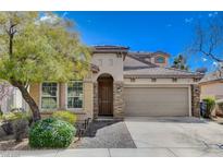 Charming single-story home featuring a two-car garage, well-maintained landscaping, and a welcoming entrance at 11023 Bellatrix Ct, Las Vegas, NV 89135