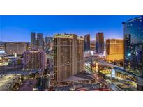 Striking Las Vegas city view with glittering lights at dusk from a high-rise condo unit at 135 E Harmon Ave # 2821, Las Vegas, NV 89109