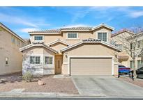 Beige two-story home featuring a two-car garage, desert landscaping, and a tiled roof at 1646 Little Crow Ave, Las Vegas, NV 89123