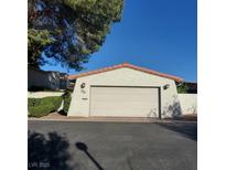 Attached one car garage with direct access on a sunny day at 2305 Plaza Del Grande, Las Vegas, NV 89102