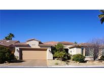 Charming single-story home with a well-maintained front yard and desert landscaping at 5059 Pensier St, Las Vegas, NV 89135