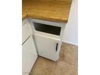 This shows a cabinet with white doors and laminate countertop at 575 S Royal Crest Cir # 18, Las Vegas, NV 89169