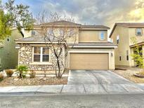 Charming two-story home featuring a stone facade and a spacious two-car garage at 8027 Anasazi Ranch Ave, Las Vegas, NV 89131