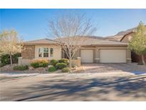 Charming single-story home with a two-car garage, mature landscaping, and a well-maintained front yard at 10507 Bryn Haven Ave, Las Vegas, NV 89135