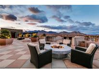 Relax on this amazing rooftop patio, with fire pit, seating, and mountain views at 11441 Allerton Park Dr # 217, Las Vegas, NV 89135