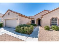 Charming single-story home featuring a low-maintenance front yard and attached two-car garage at 2253 Laurel Heights Ln, Henderson, NV 89052