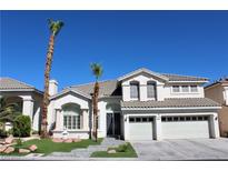 Charming two-story home featuring a three-car garage and well-manicured landscaping at 3948 Windansea St, Las Vegas, NV 89147