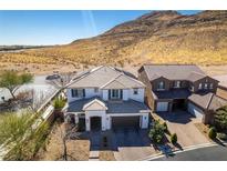 Beautiful two-story home with a well-maintained yard and mountain view at 9519 Chandler Springs Ave, Las Vegas, NV 89148