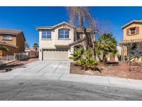 Charming two-story home with desert landscaping, neutral stucco, and two-car garage at 4141 Coburn St, North Las Vegas, NV 89032