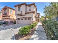 Charming two-story home with a two-car garage, balcony, and well-maintained landscaping in a desirable neighborhood at 2478 Cordoba Bluff Ct, Las Vegas, NV 89135