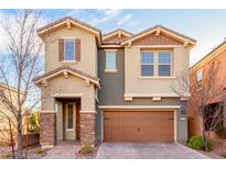 Charming two-story home with a well-manicured lawn and a two-car garage at 2149 Morro Vista Dr, Las Vegas, NV 89135